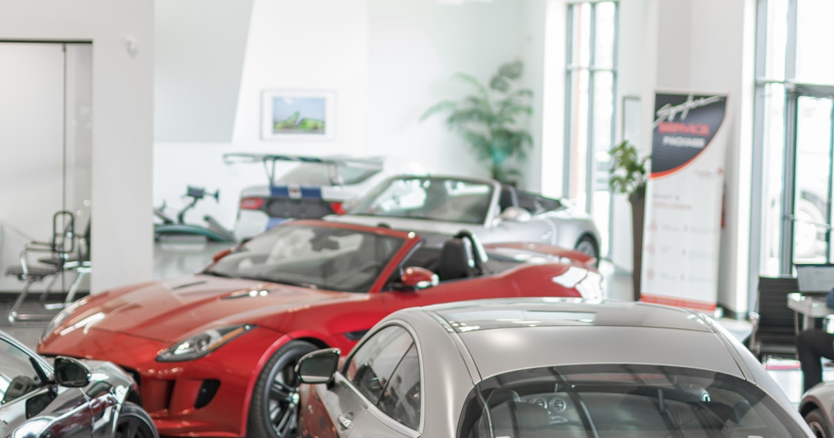 New cars on display in a dealership showroom