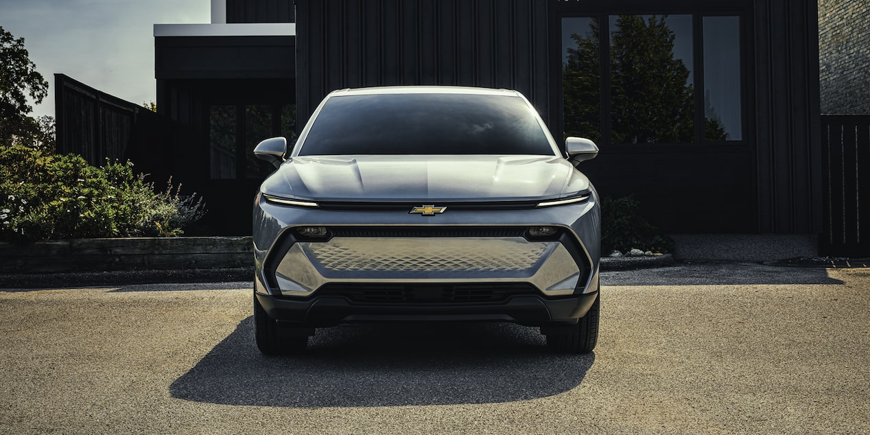 Chevy Equinox EV and Hyundai IONIQ 5 at a public DC fast charger