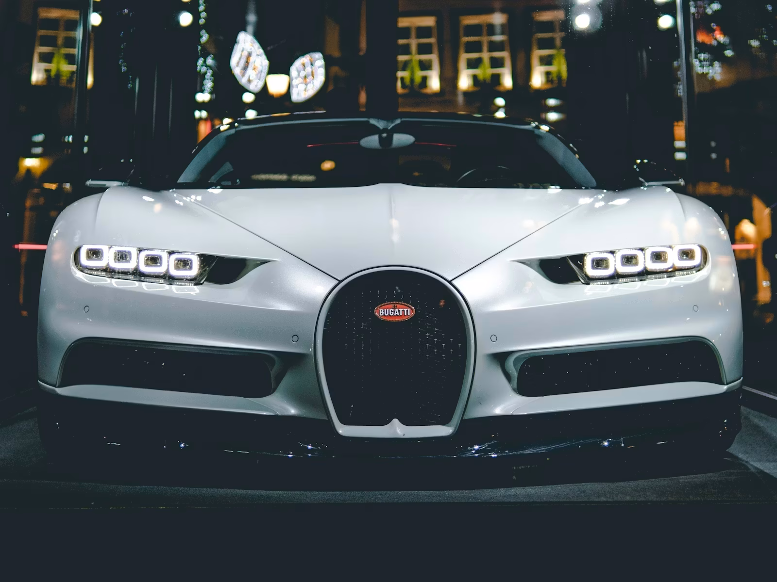 Performance sports car on an empty road at dusk